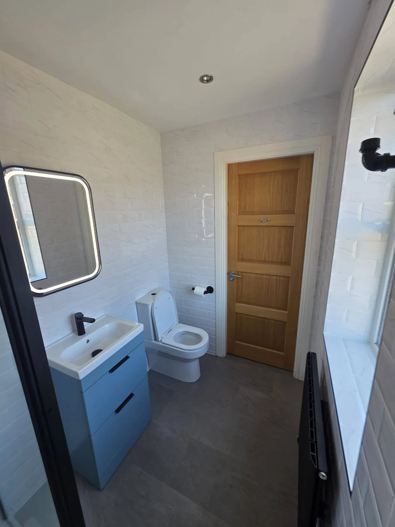 Completed bathroom photograph 2 of Bright Ensuite Remodel