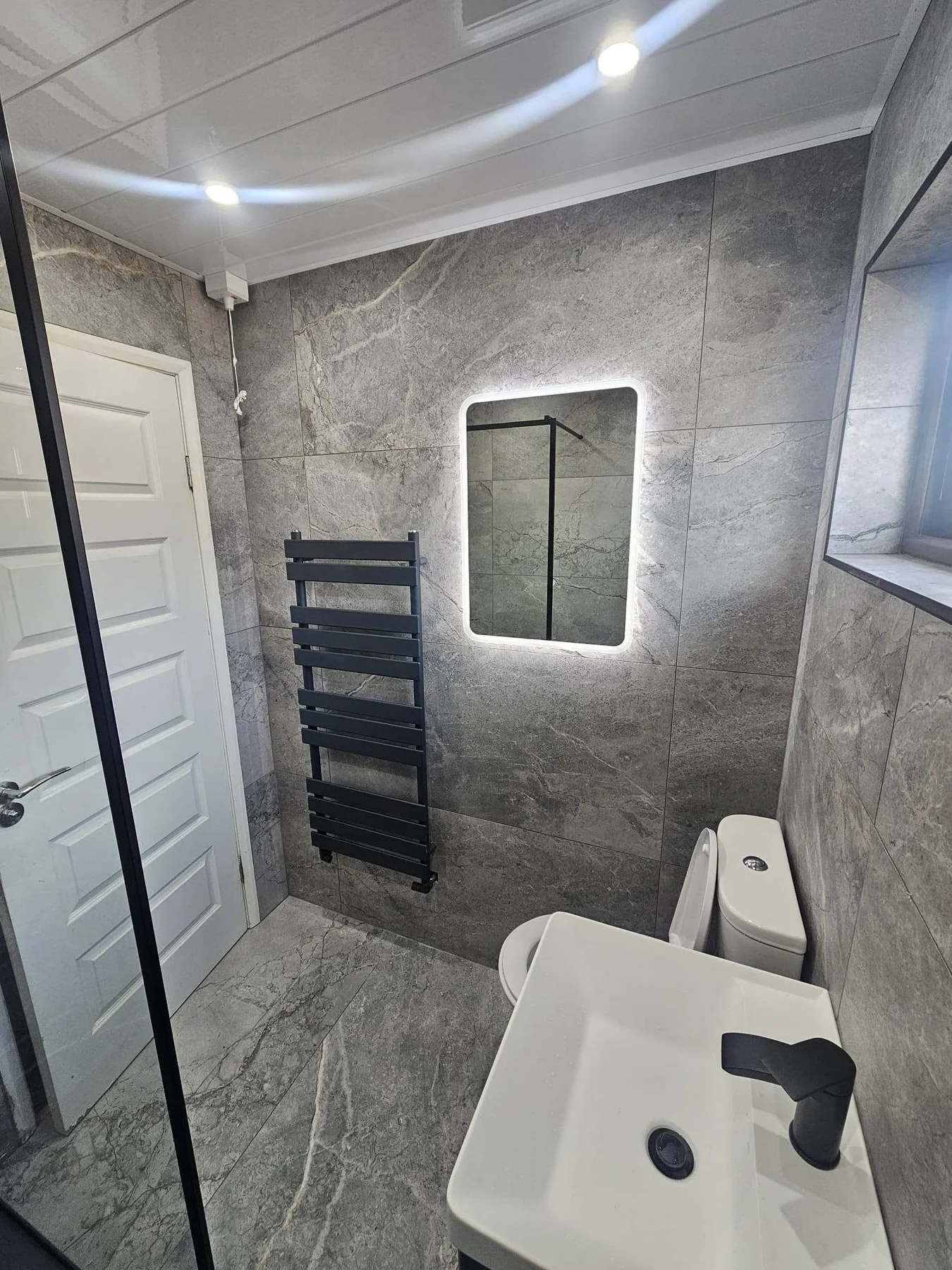 Premium grey bathroom installation by Luxeline Bathrooms