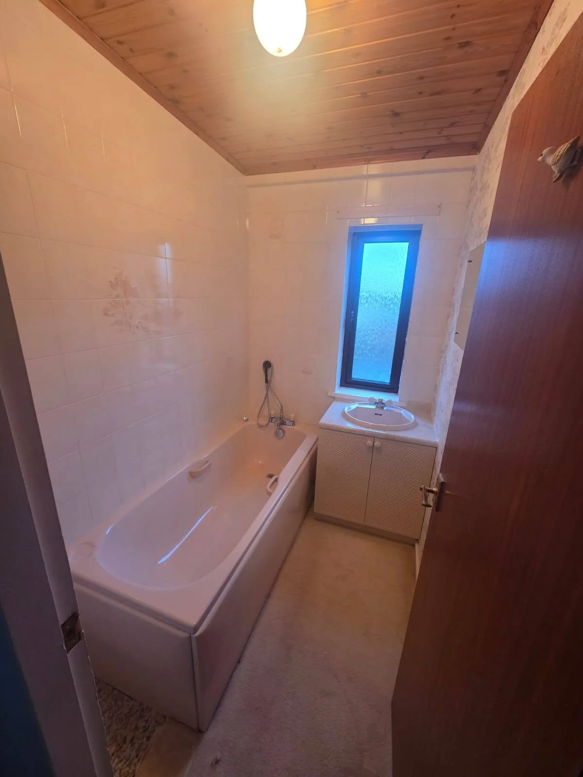 Before photograph 1 of Narrow Bathroom Bath-to-Shower Upgrade